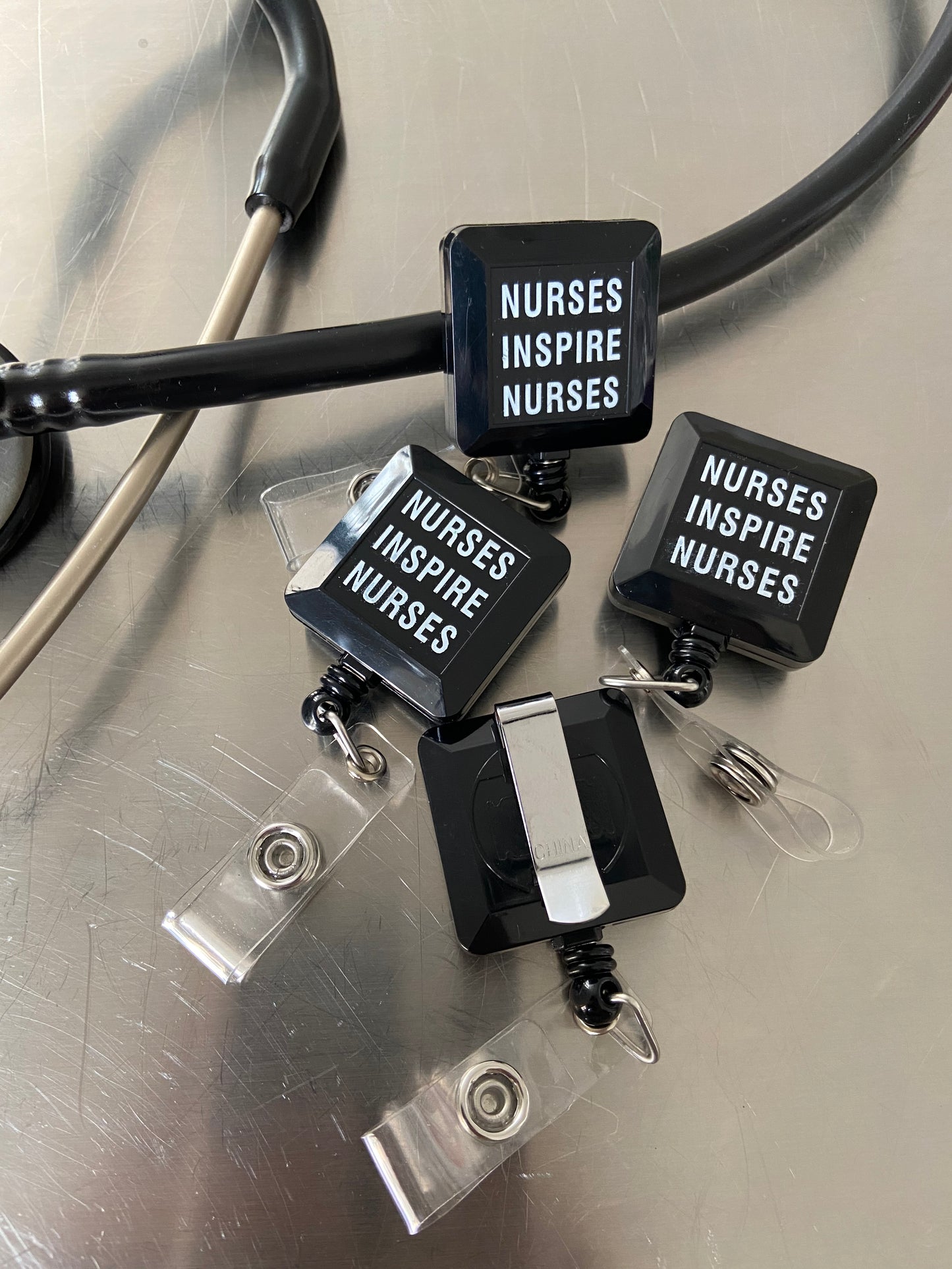 NIN Badge Reel